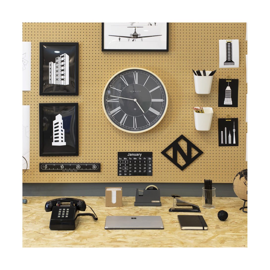 Dark Grey and plywood Mr Architect wall clock by Newgate World in an office setting