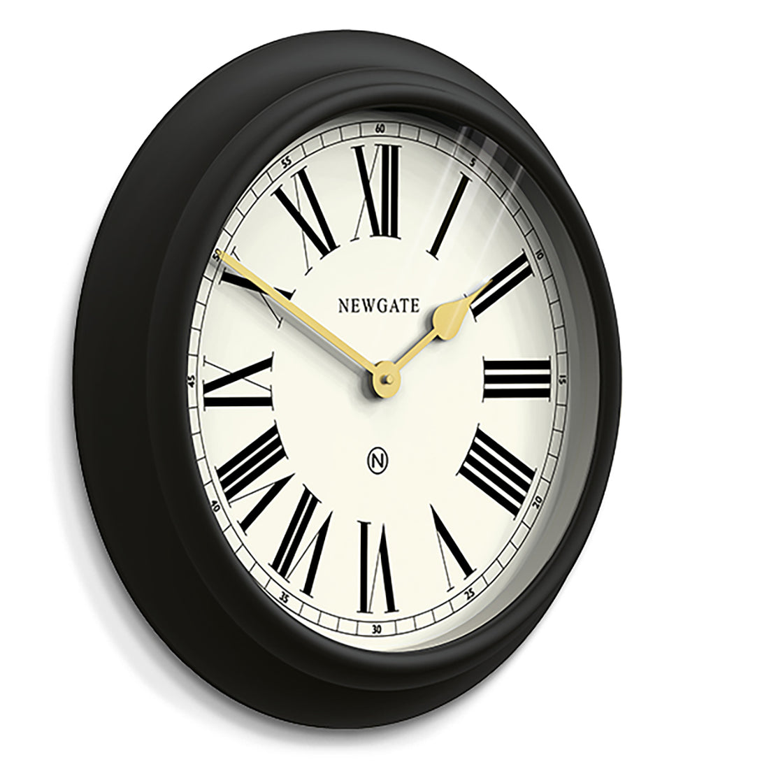 Side view of the Newgate World large Chocolate Shop wall clock in Black with Gold hands and a cream Roman numeral dial