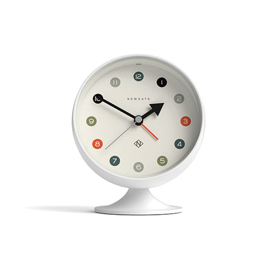 Skew style shot view of the Retro Spheric alarm clock by Newgate World with an Arabic dial and a Pebble White case - Front