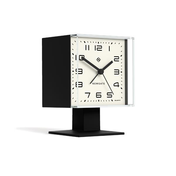 Skew view of the Retro Victor alarm clock by Newgate Clocks with a square case and an Arabic dial in matt black